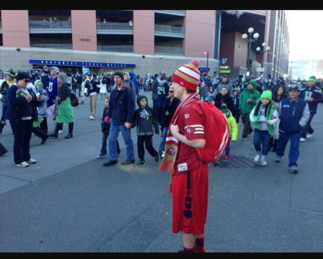 Fans put rivalry aside for SF fan at Seahawks parade