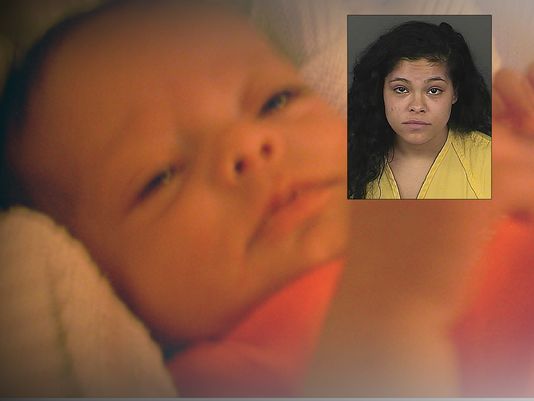 Family by mom's side after infant's beating death 