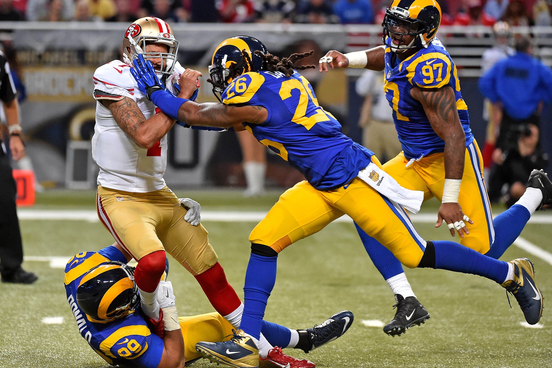 San Francisco 49ers quarterback Colin Kaepernick (7) is tackled by