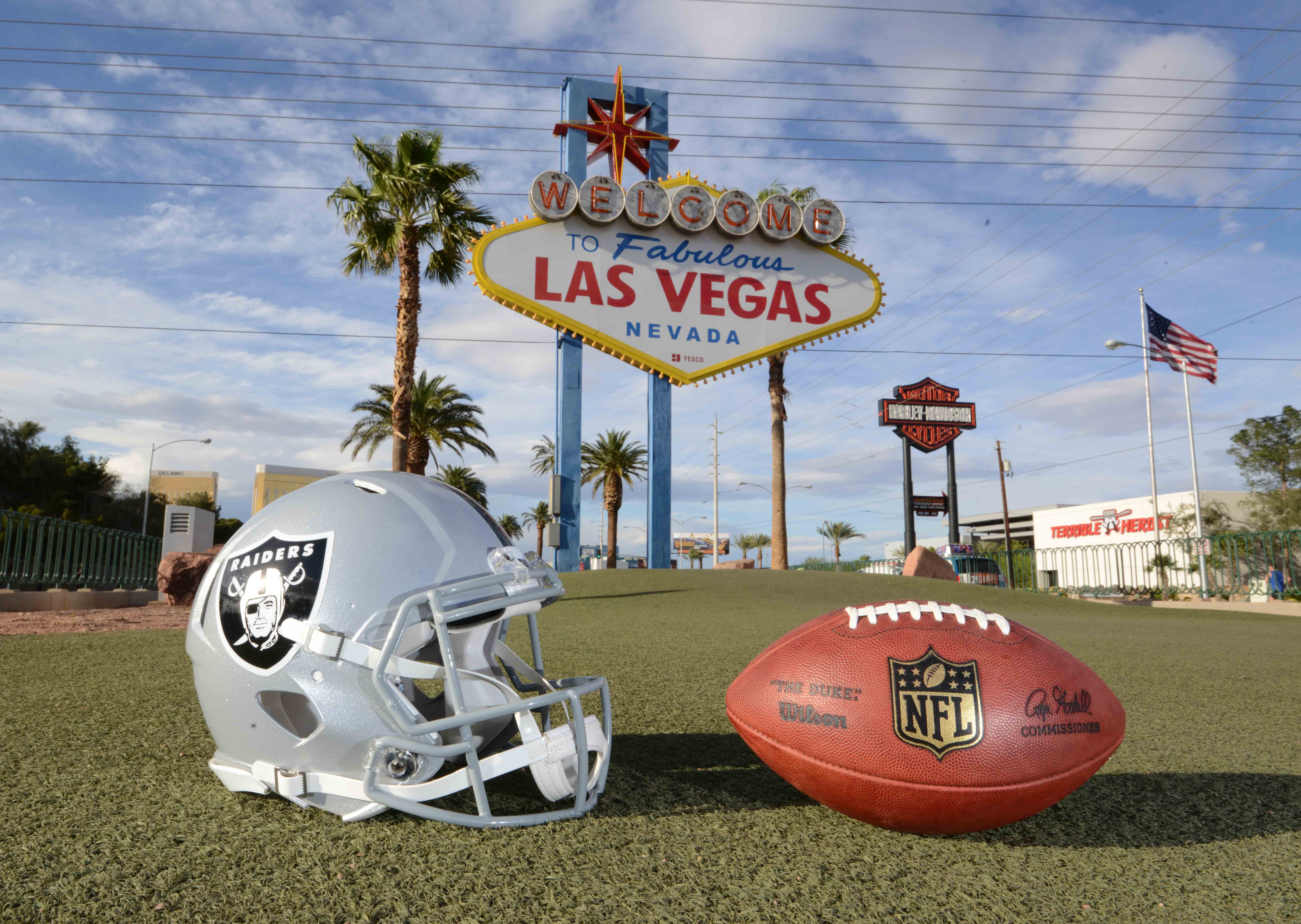 A Las Vegas Raiders helmet and Wilson 2020 NFL “The Duke” official