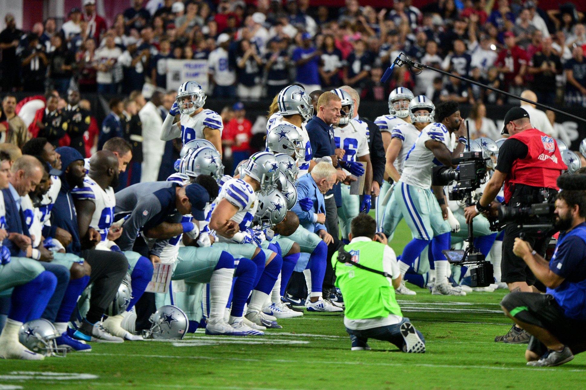 NFL players lock arms in national anthem at Cowboys-Cardinals game